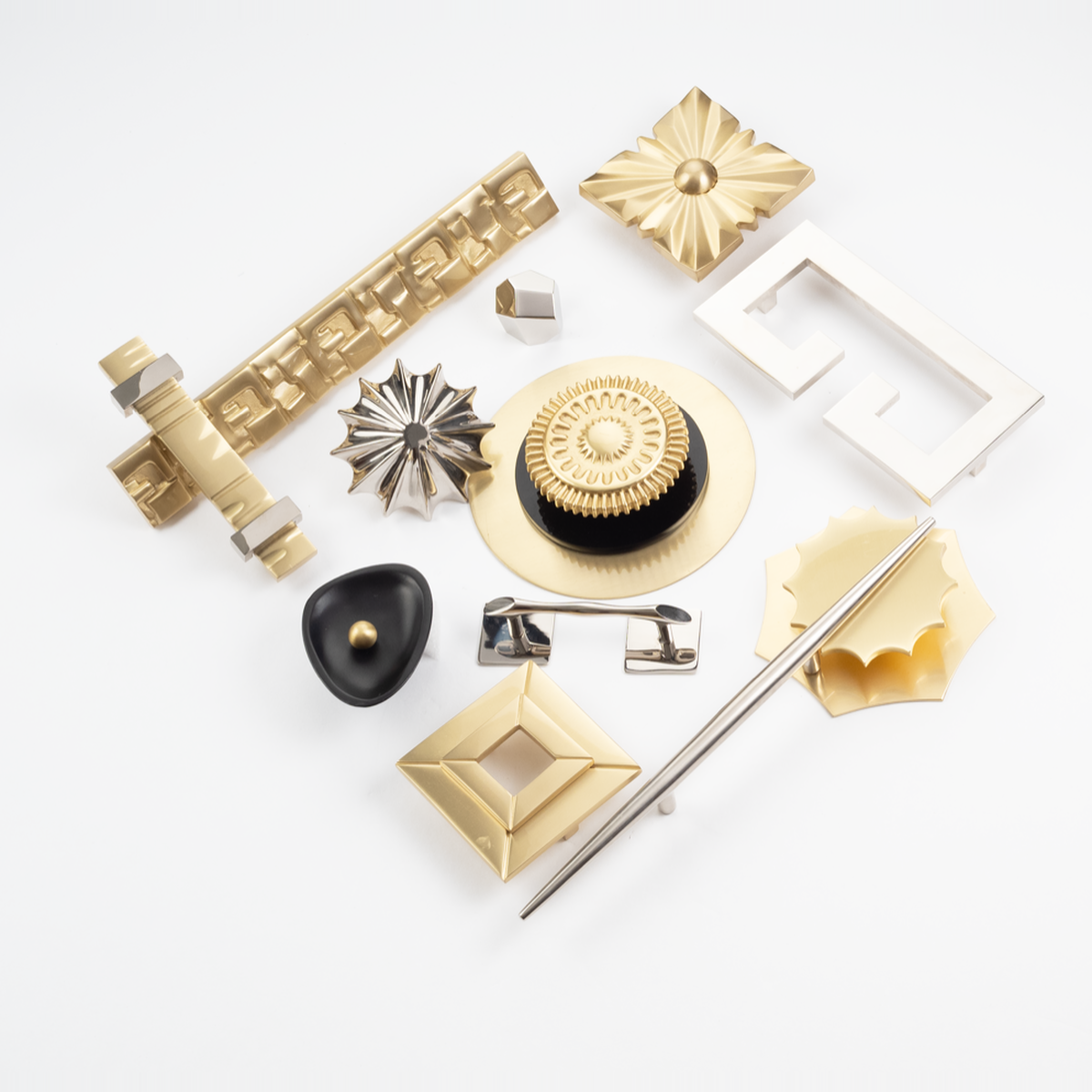 Assorted Lisa Jarvis hand-cast brass hardware in satin brass, polished nickel, and matte black finishes for New York Hardware