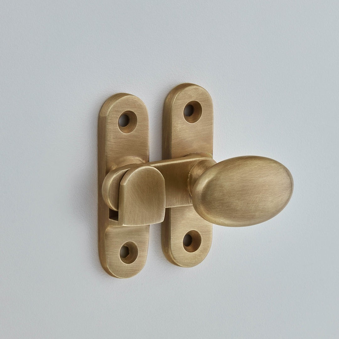 Croft Oval Knob Cabinet Catch 59mm / Light Antique Brass