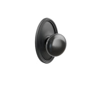 Emtek Concealed Fastener Ebony Porcelain Knob Set With Oval Rosette
