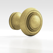 Colonial Bronze Series 676 1.5" Round Stepped Cabinet Knob Back-To-Back Shower Kit Distressed Antique Brass / 1.5"