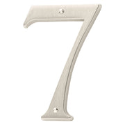 Metallic number '7' on a black background