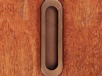 Thick Oval Flush Pull 5 1/2" (140mm) - Antique English - New York Hardware