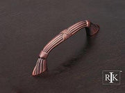 Ornate Bow Pull with Lines and Crosses 4 11/16" (119mm) - Distressed Copper - New York Hardware Online